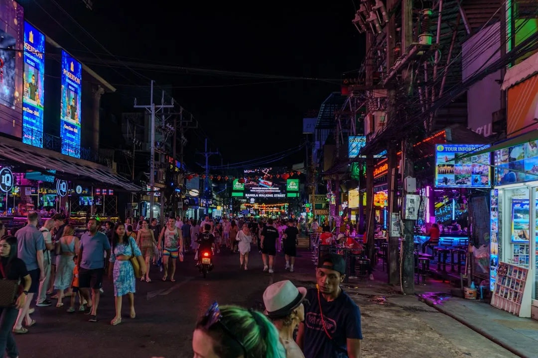 Bangla Road Phuket at night — neon-lit walking street in Patong packed with crowds and entertainment venues