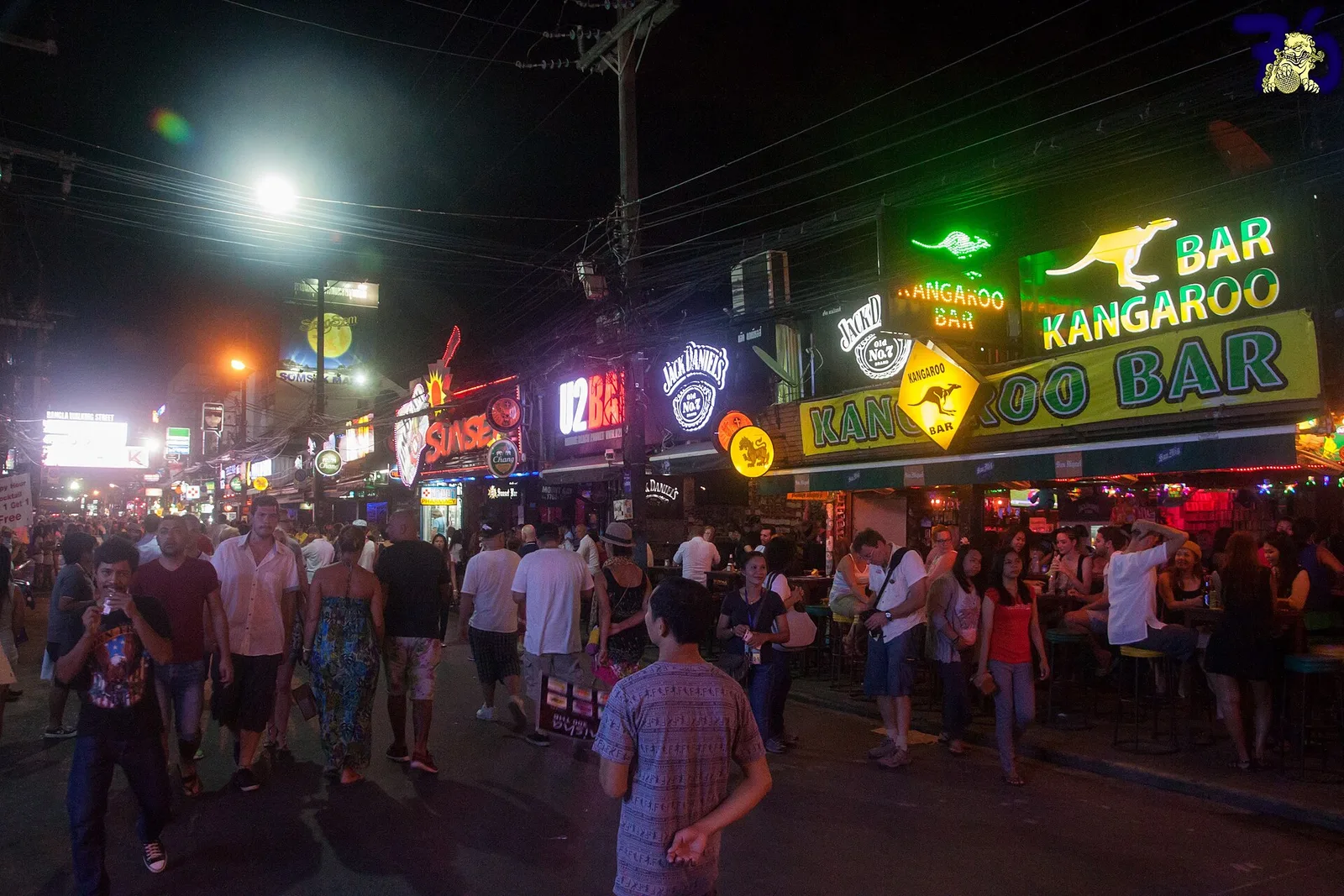 Bangla Road Phuket price guide — neon bar signs and crowd on the Patong walking street at peak hour