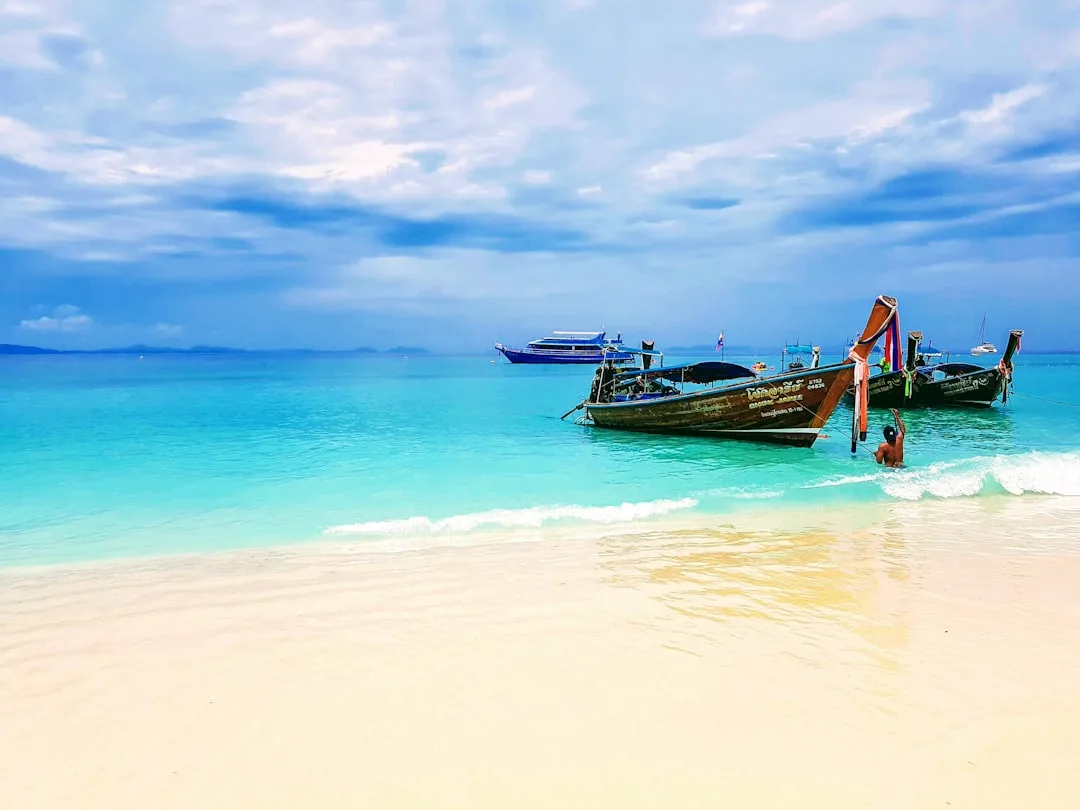 Coral Island Phuket (Koh Hae) turquoise water and Long Beach, a popular day trip from Chalong Pier