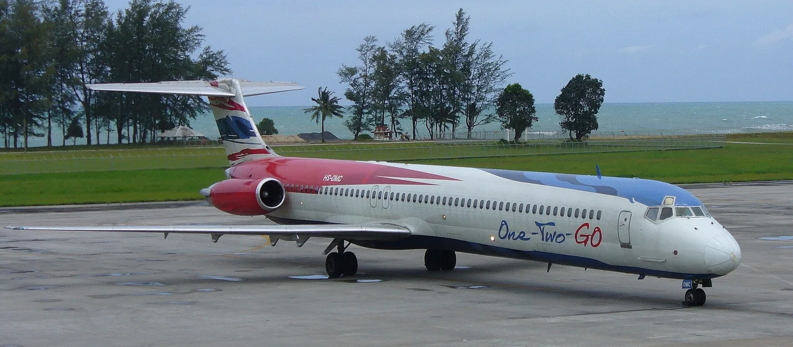 Phuket airport transfer — taxis lined up outside Phuket International Airport arrivals