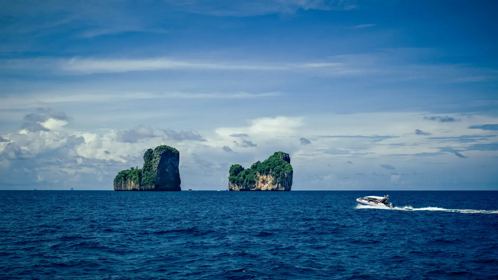 Speedboat moored off Phi Phi on a Phuket speedboat tour