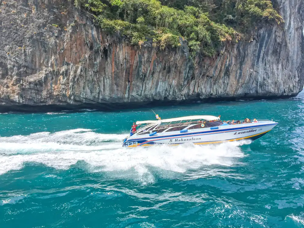 Small-group speedboat operator crew on a Phuket speedboat tour