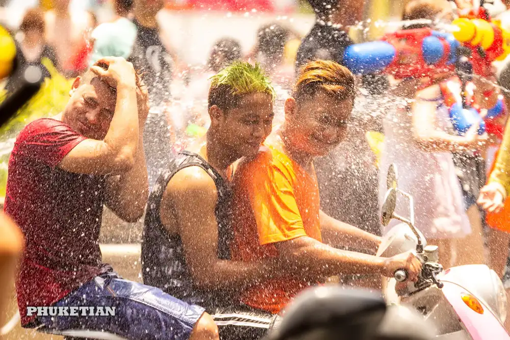 Songkran Phuket water festival: revellers soaking each other with water guns on Bangla Road, Patong