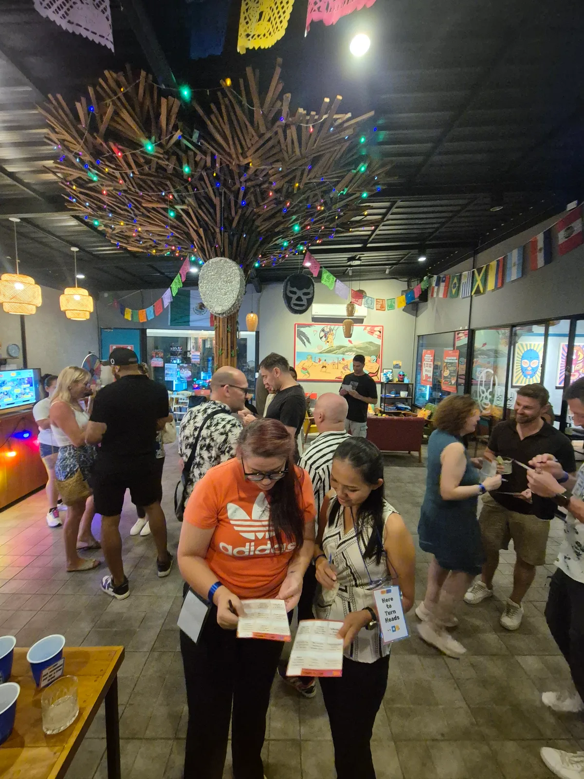 Meet and mingle social event with guests connecting at a Phuket venue